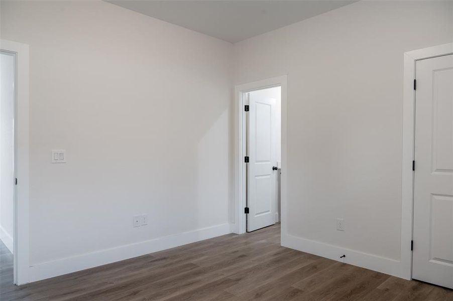 Empty room featuring hardwood / wood-style floors