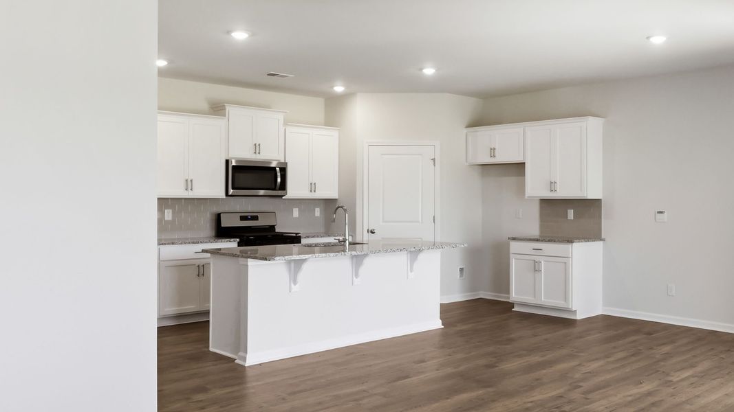 Furnished interior view inside a new home in Tap Root Farms, Fletcher (Image 11).