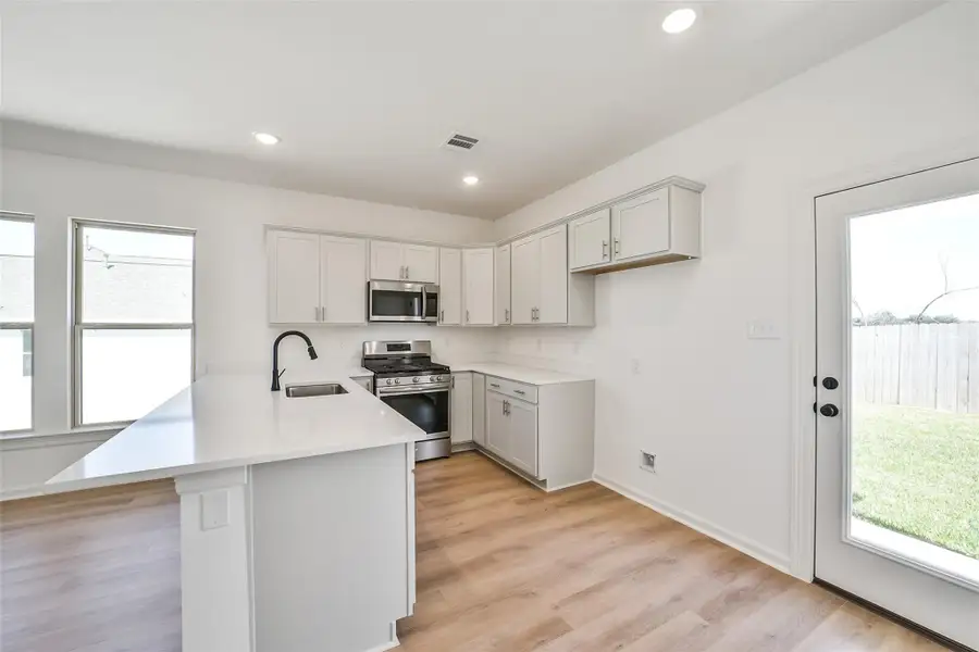 Furnished interior view inside a new home in Mostyn Springs, Magnolia (Image 4). Furnished interior view inside a new home in Mostyn Springs, Magnolia (Image 4).