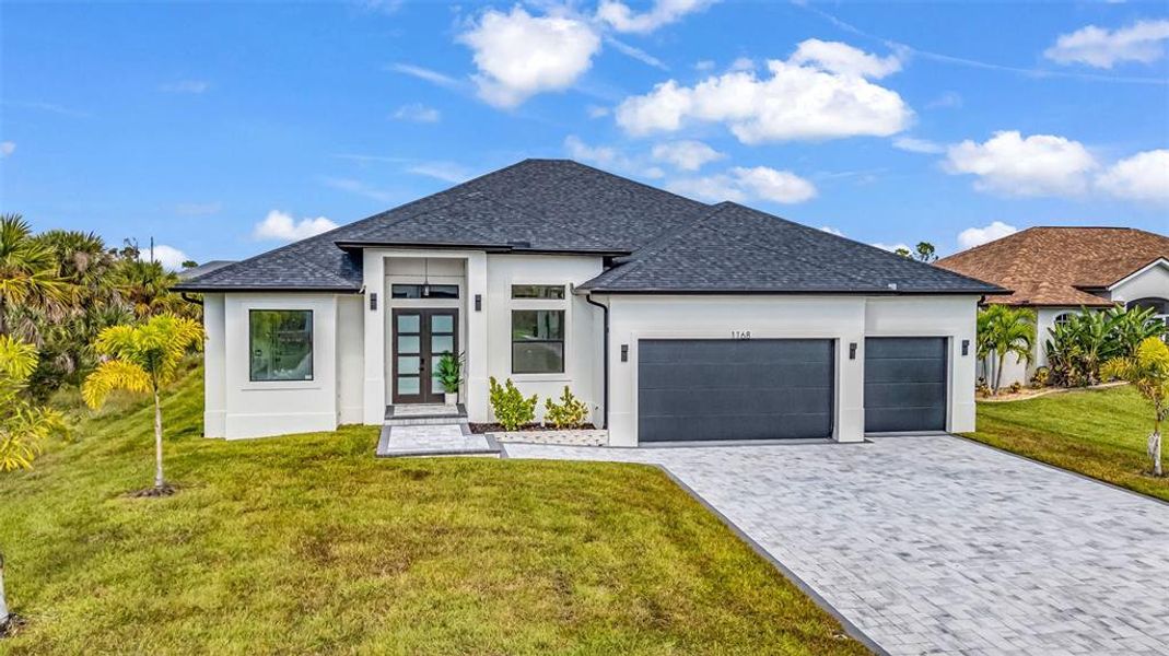 Front exterior of a new home in , Rotonda West, FL, highlighting curb appeal (Image 1). Front exterior of a new home in , Rotonda West, FL, highlighting curb appeal (Image 1).