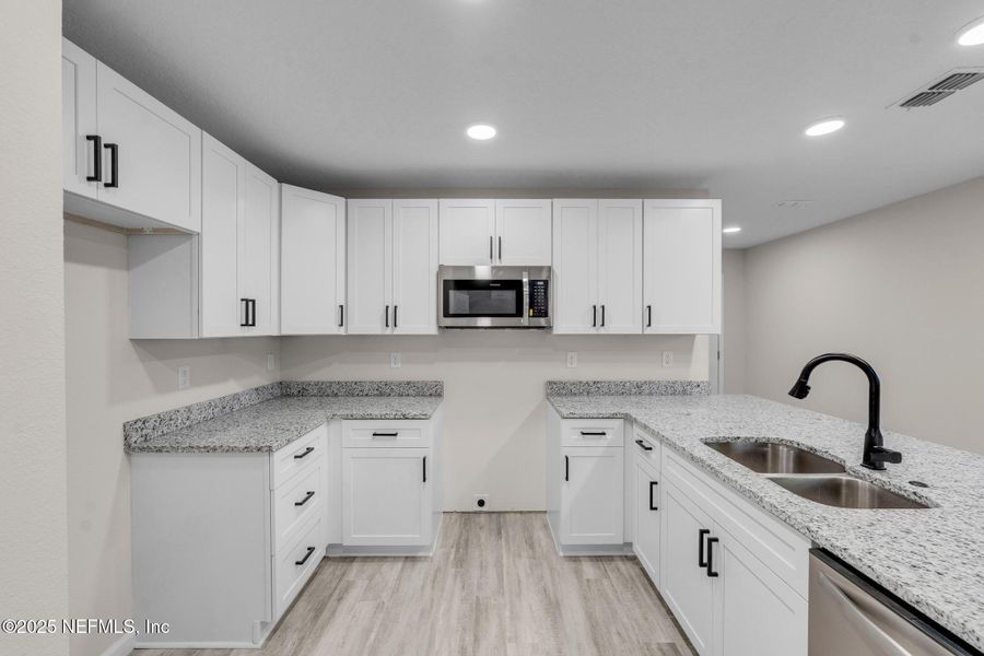Furnished interior view inside a new home in , Jacksonville (Image 9).