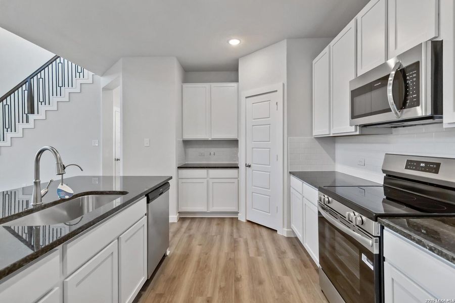 Furnished interior view inside a new home in Red Hawk Landing, San Antonio (Image 9).