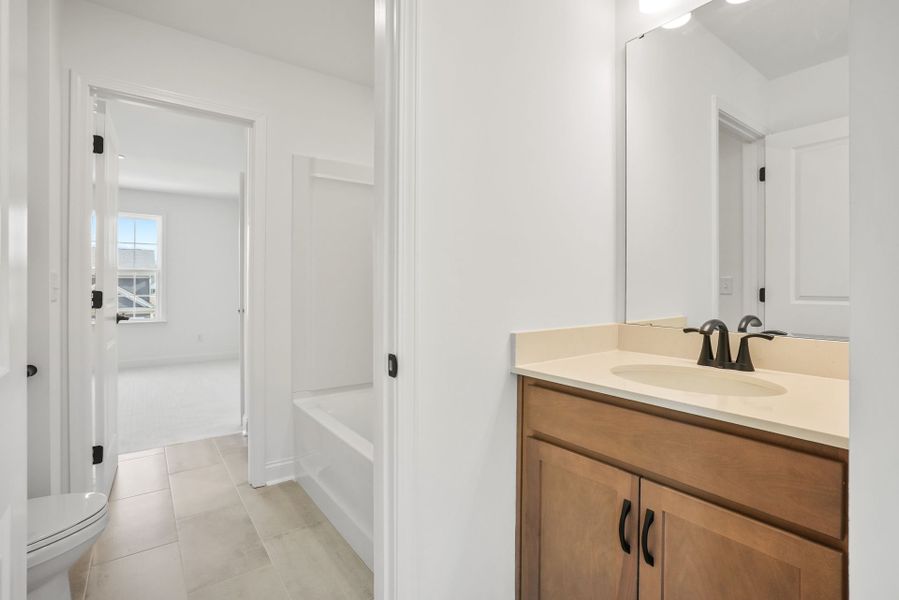 Furnished interior view inside a new home in Forest Creek, Waxhaw (Image 51).
