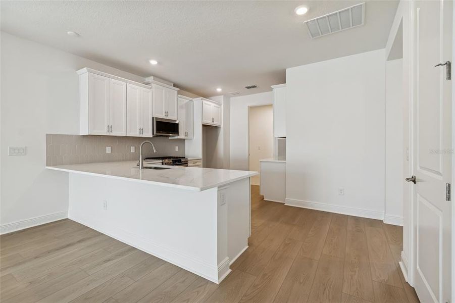 Furnished interior view inside a new home in SeaFlower, Bradenton (Image 3). Furnished interior view inside a new home in SeaFlower, Bradenton (Image 3).