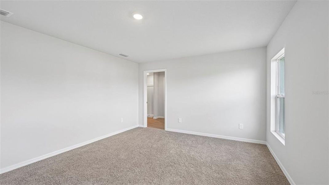 Spacious, unfurnished interior of a new home in Rye Crossing, Parrish (Image 22).