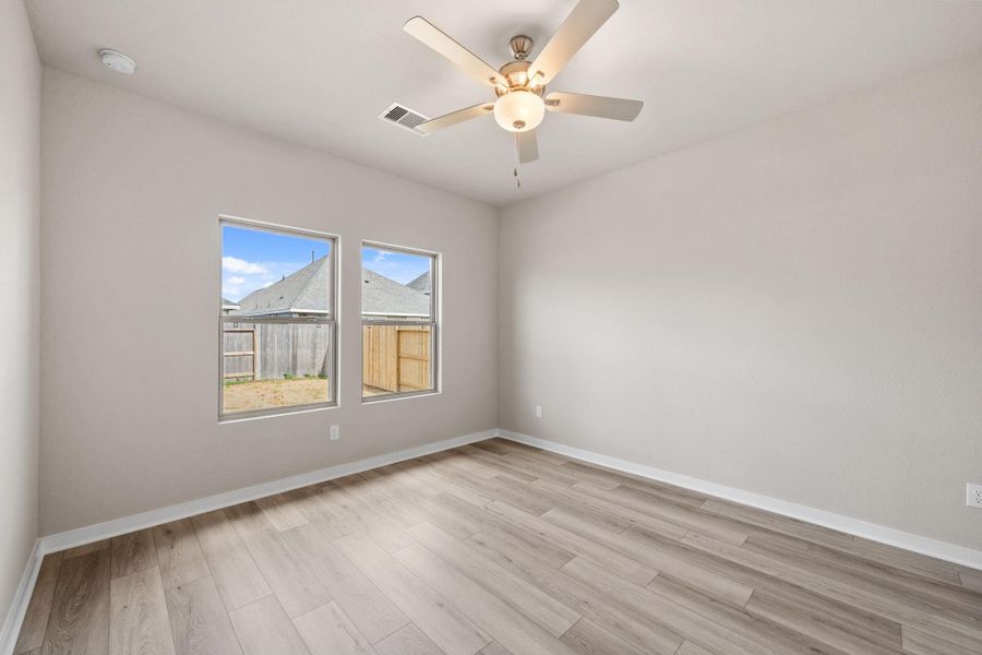 Spacious, unfurnished interior of a new home in Windrose Green 50', Angleton (Image 28).