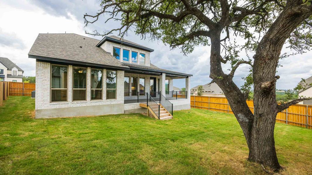 Exterior details and patio area of a home in Parkside on the River West, Georgetown (Image 2).