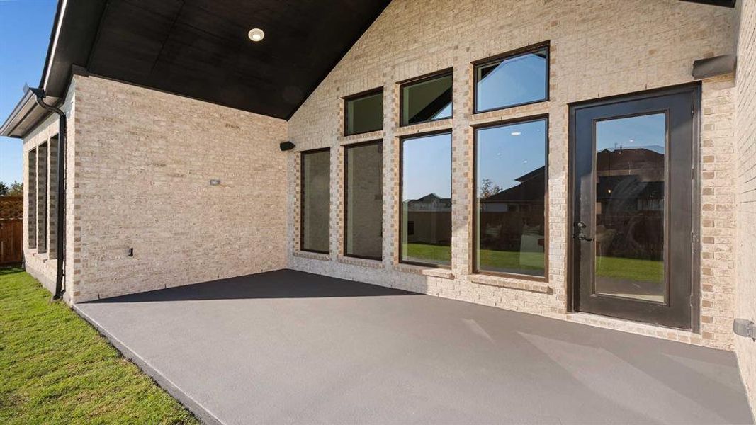 Exterior details and patio area of a home in Somerset Park 80', Rockwall (Image 3). Exterior details and patio area of a home in Somerset Park 80', Rockwall (Image 3).