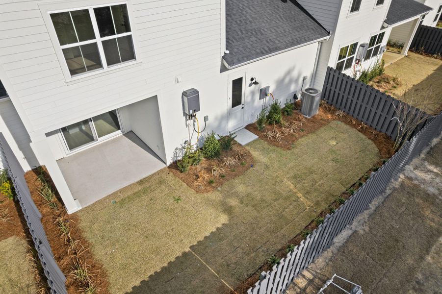 Exterior details and patio area of a home in , Johns Island (Image 3).