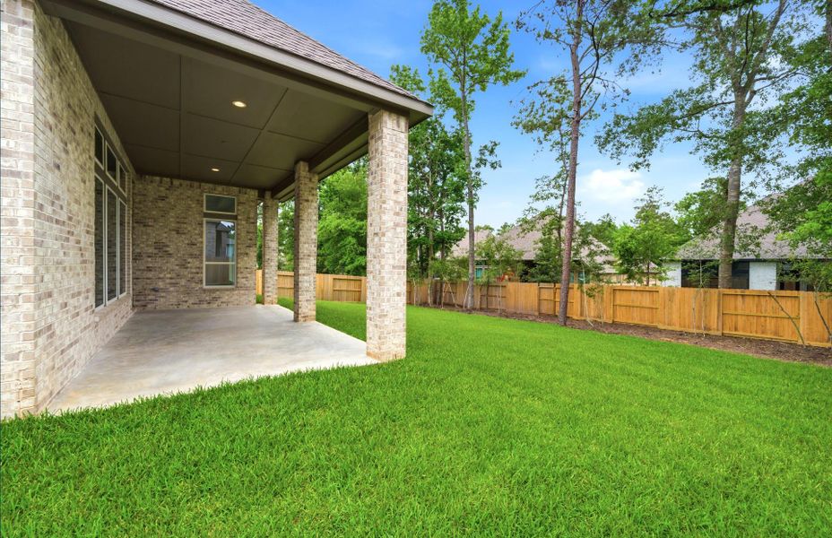 Exterior details and patio area of a home in The Woodlands Hills 65′, Willis (Image 27). Exterior details and patio area of a home in The Woodlands Hills 65′, Willis (Image 27).