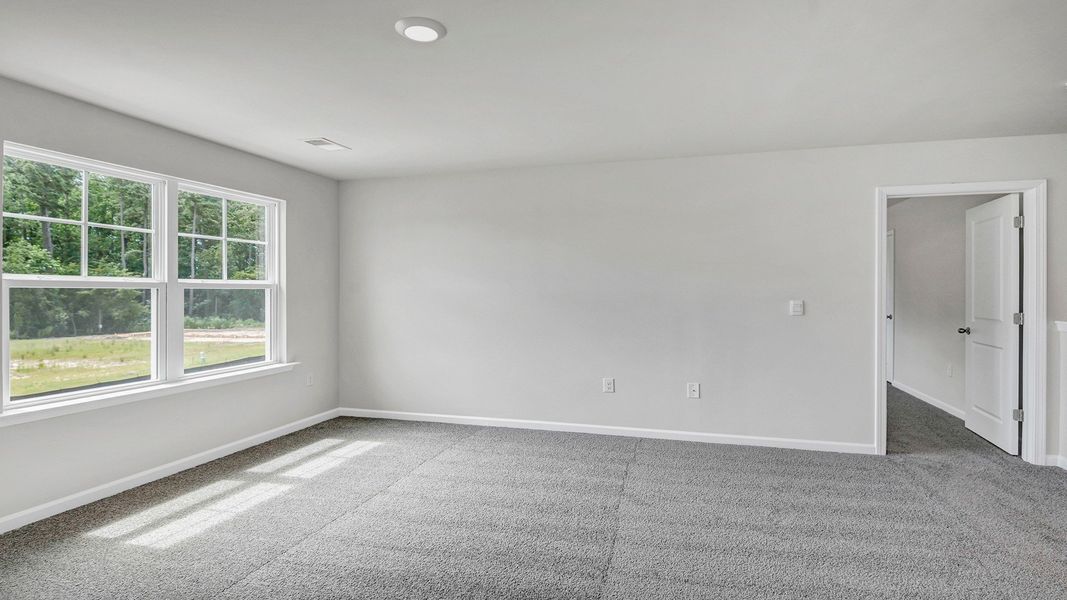 Representative unfurnished interior of a home built from the MANNING by D.R. Horton in Sease's Pond, Gilbert (Image 27).