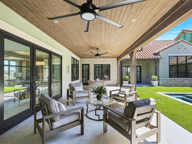 View of patio / terrace featuring an outdoor hangout area and ceiling fan