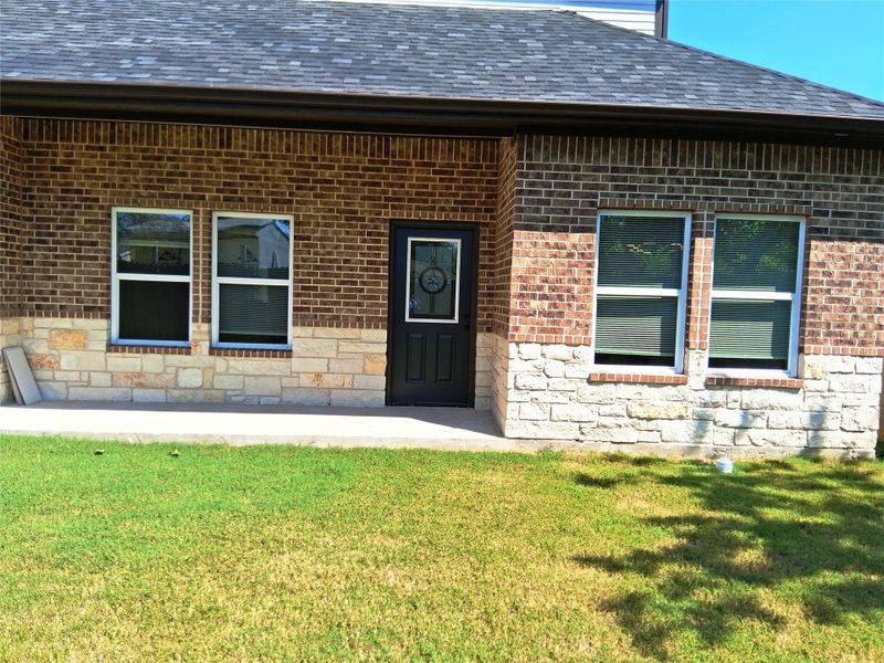 The back door to a good size back yard The back door to a good size back yard