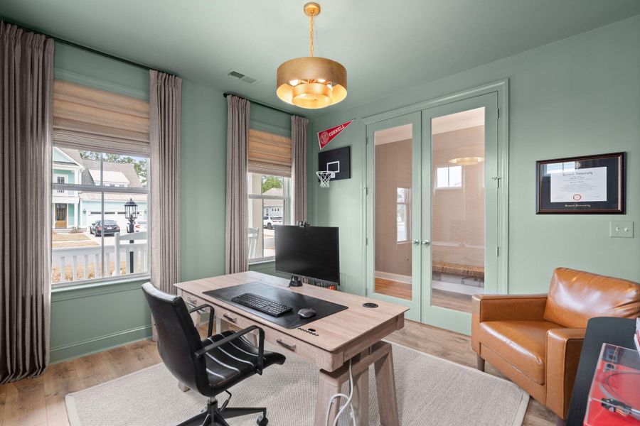 Furnished interior view inside a new home in Tidewater at Lakes of Cane Bay, Summerville (Image 40).