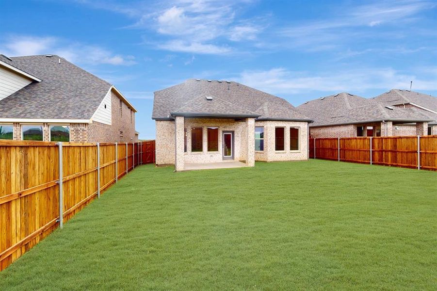 Front exterior of a new home in Lilybrooke at Legacy Hills, Celina, TX, highlighting curb appeal (Image 18). Front exterior of a new home in Lilybrooke at Legacy Hills, Celina, TX, highlighting curb appeal (Image 18).