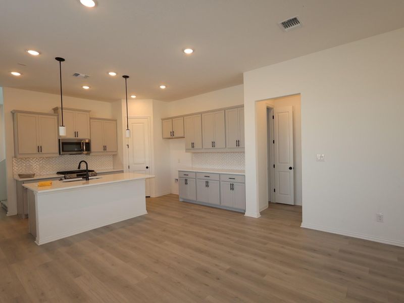 Furnished interior view inside a new home in Heritage, Dripping Springs (Image 9).