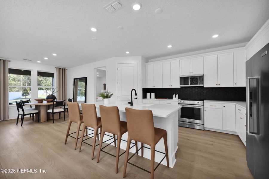 Furnished interior view inside a new home in Hyland Trail, Green Cove Springs (Image 4).