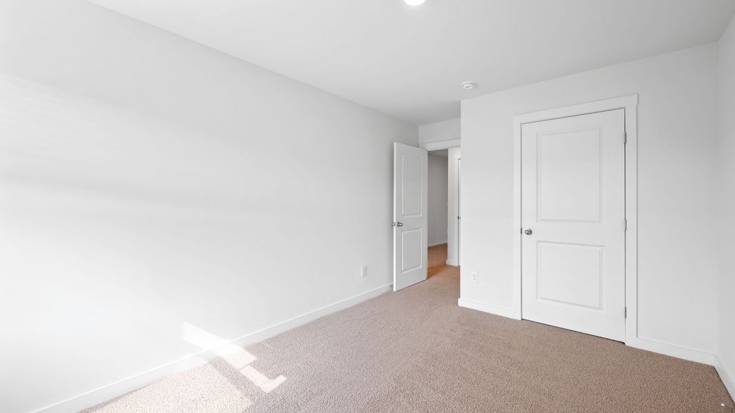 Spacious, unfurnished interior of a new home in The Cove at Thrasher Landing, Hixson (Image 21).