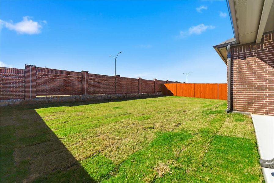 Exterior details and patio area of a home in Northstar, Haslet (Image 22).