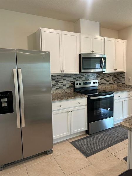 Furnished interior view inside a new home in Deer Run, Davenport (Image 3). Furnished interior view inside a new home in Deer Run, Davenport (Image 3).