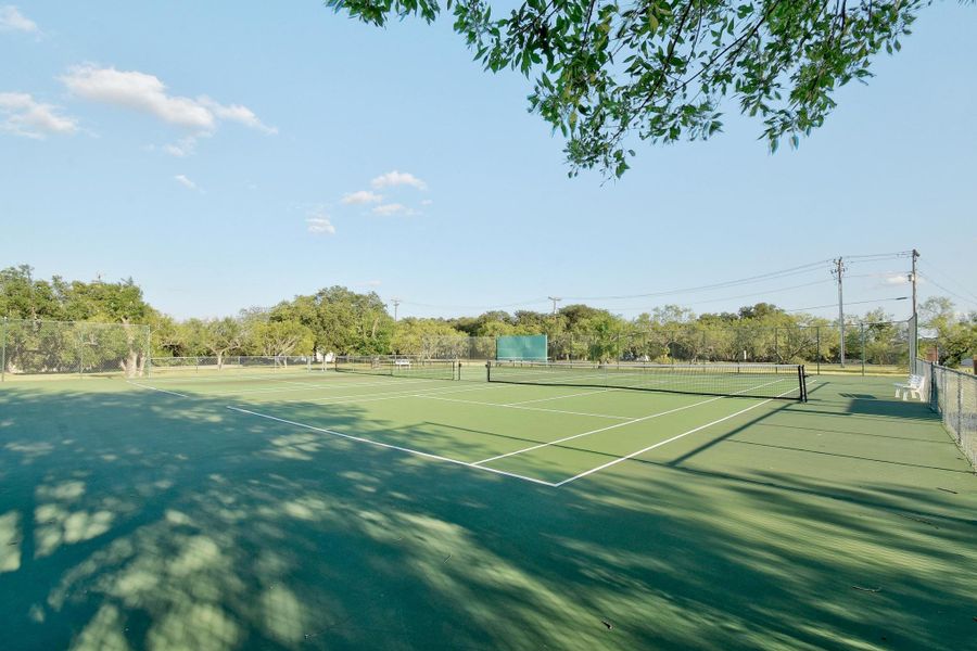 View of tennis court featuring community basketball court View of tennis court featuring community basketball court