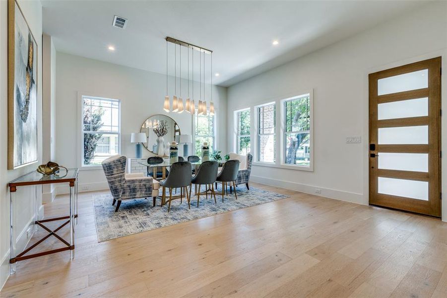 dining room with designer chandlier