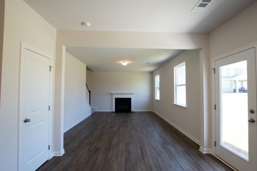 Representative unfurnished interior of a home built from the Fairfax by Piedmont Residential in Falls Creek, Flowery Branch (Image 11).