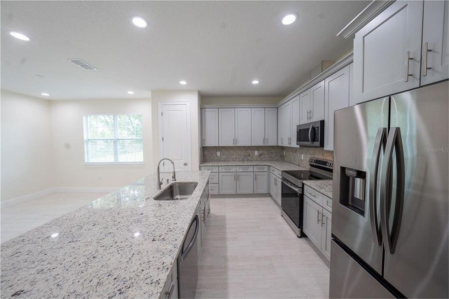 Furnished interior view inside a new home in , Summerfield (Image 12).