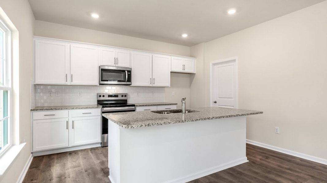 Furnished interior view inside a new home in Villa Grande, Winterville (Image 7).