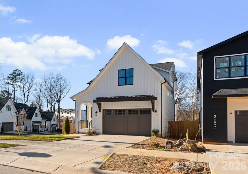 Front exterior of a new home in , Charlotte, NC, highlighting curb appeal (Image 22). Front exterior of a new home in , Charlotte, NC, highlighting curb appeal (Image 22).