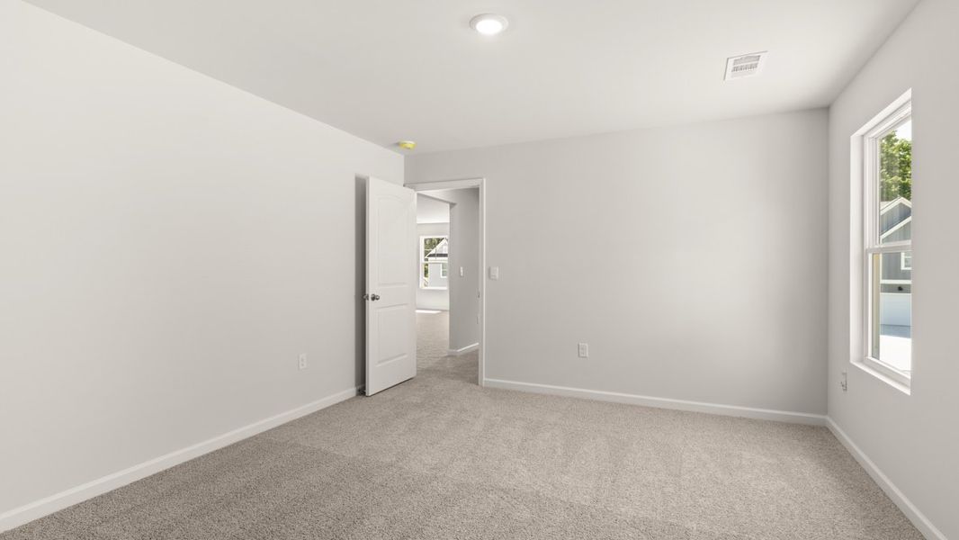 Representative unfurnished interior of a home built from the Mansfield by D.R. Horton in Falcon Landing, Gainesville (Image 28).
