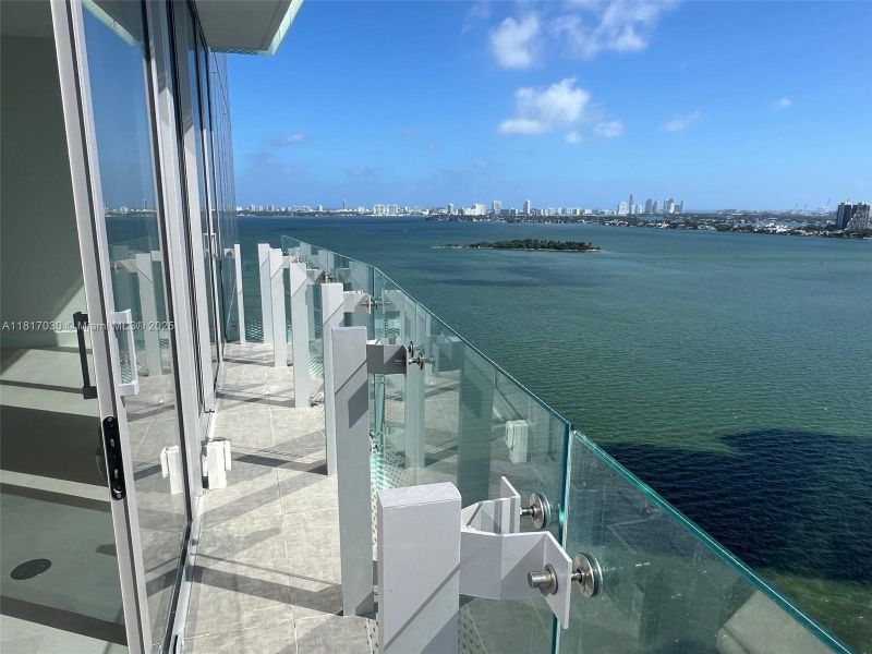 Exterior details and patio area of a home in Missoni Baia, Miami (Image 3).