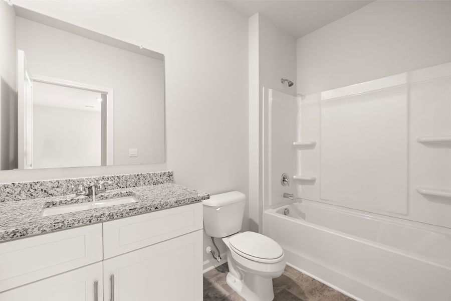 Representative furnished interior of a home built from the Mansfield by D.R. Horton in Southwind Village, Evans (Image 9).