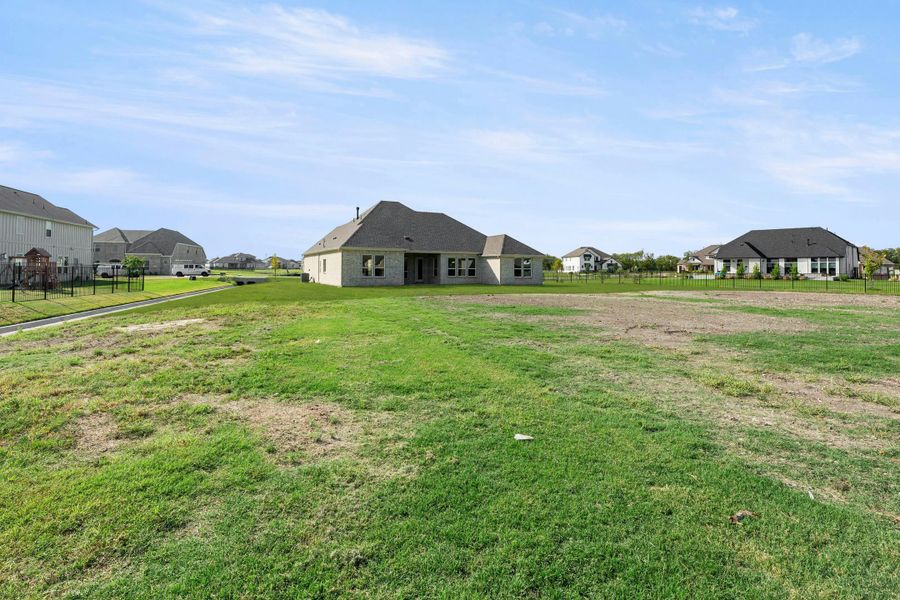 Front exterior of a new home in Ridge Park Estates, Royse City, TX, highlighting curb appeal (Image 20). Front exterior of a new home in Ridge Park Estates, Royse City, TX, highlighting curb appeal (Image 20).
