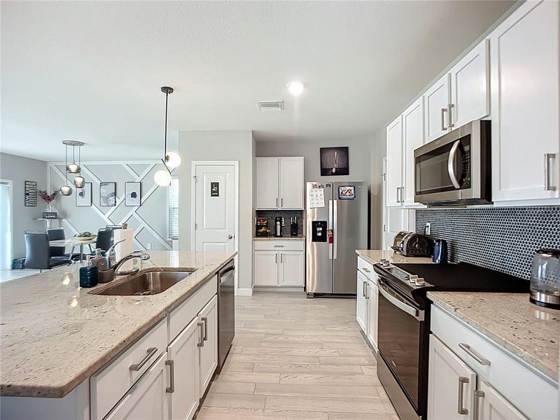 Furnished interior view inside a new home in Star Farms at Lakewood Ranch, Bradenton (Image 29).