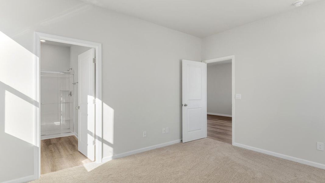 Representative unfurnished interior of a home built from the PERRY by D.R. Horton in The Cottages at Blake Farm, Wilmington (Image 12).