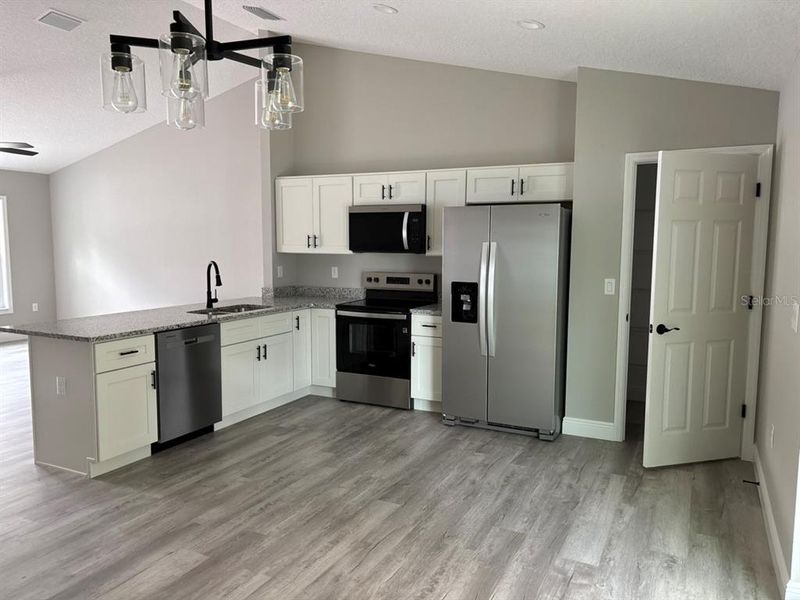 Furnished interior view inside a new home in , Dunnellon (Image 7).