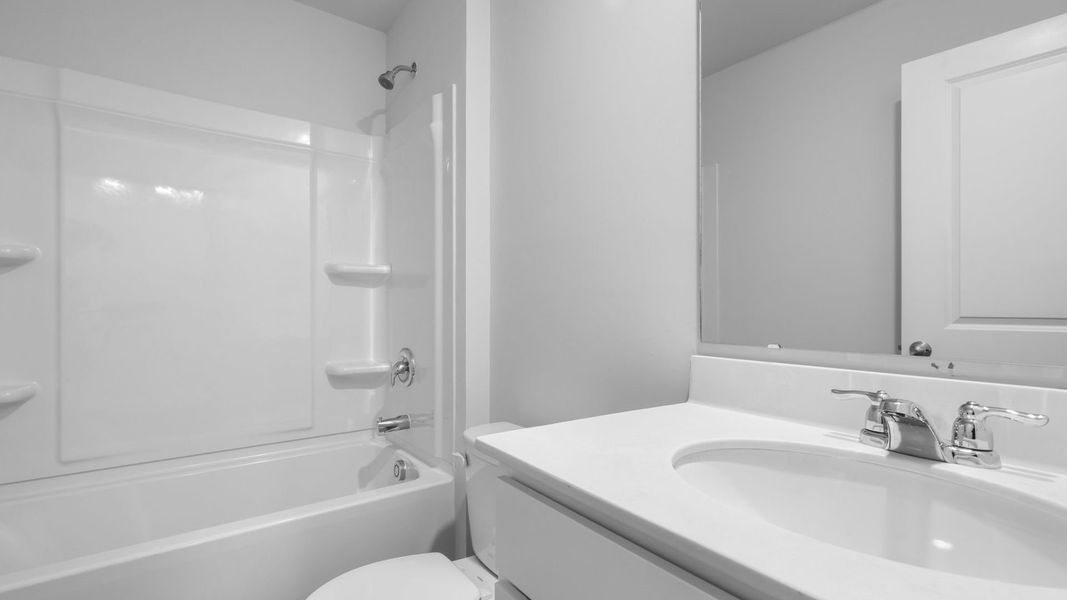 Representative furnished interior of a home built from the SULLIVAN by D.R. Horton in Evergreen, Holly Hill (Image 9).