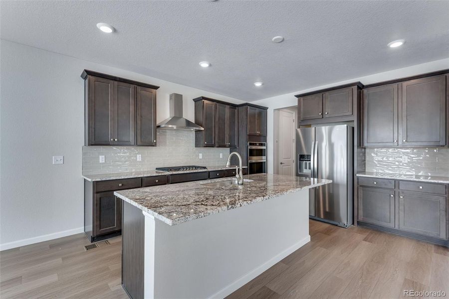 Furnished interior view inside a new home in Medley at Reunion Ridge, Commerce City (Image 17).