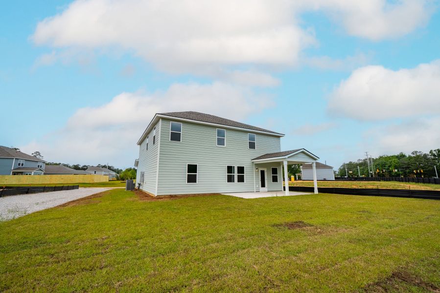 Exterior details and patio area of a home in Monroe Preserve, Chapin (Image 3).