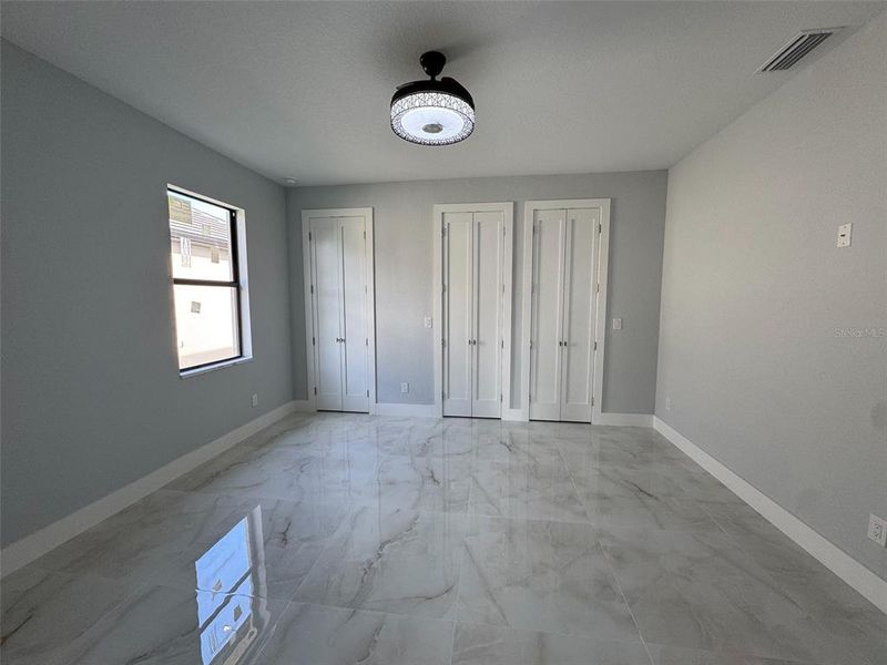 Spacious, unfurnished interior of a new home in , Port Charlotte (Image 47).