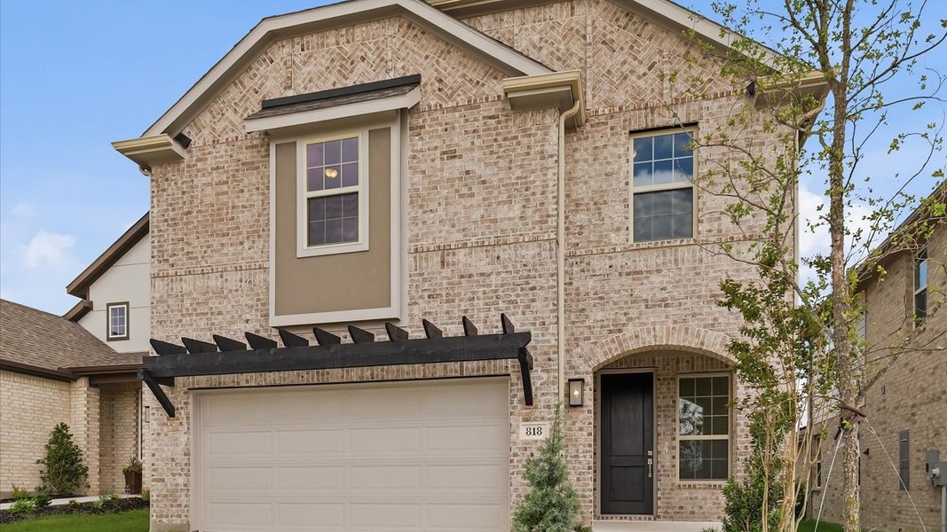 Front exterior of a new home in Westridge Journey, Princeton, TX, highlighting curb appeal (Image 24).