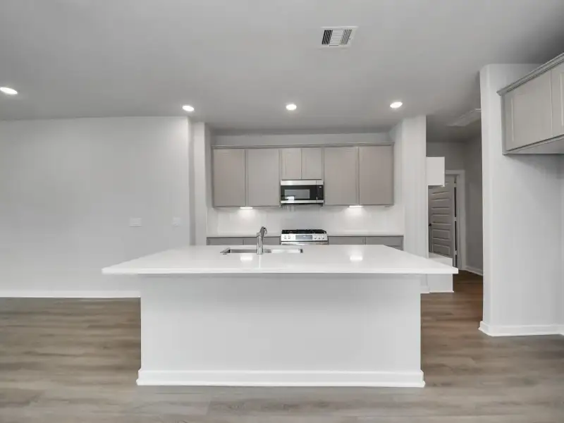Furnished interior view inside a new home in Windmill Estates, Magnolia (Image 3).