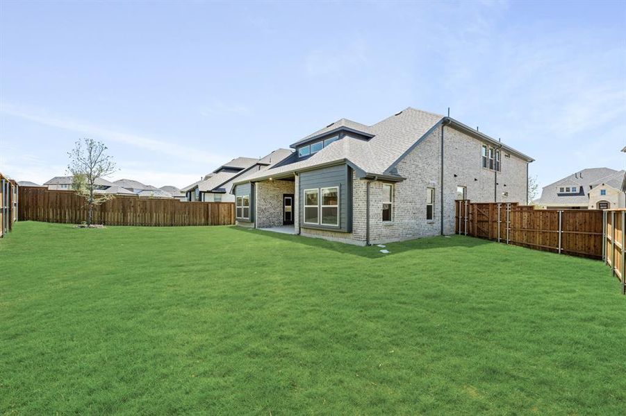 Exterior details and patio area of a home in Creekview Meadows, Pilot Point (Image 23). Exterior details and patio area of a home in Creekview Meadows, Pilot Point (Image 23).
