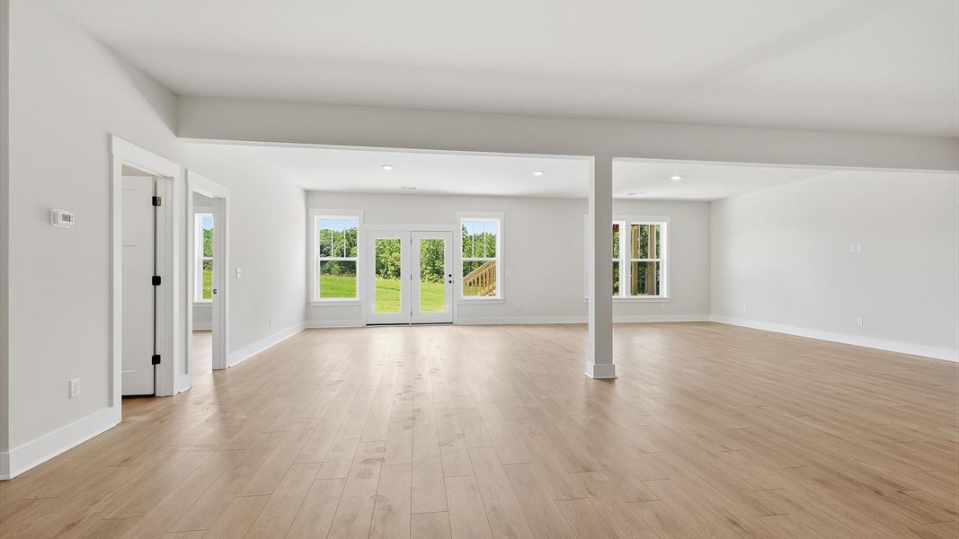 Beautifully finished basement offers the ideal space for a media room, game room, fitness area, or guest retreat in Woodruff