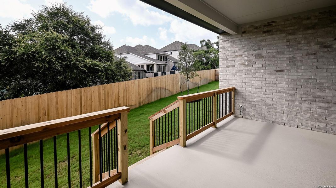 Exterior details and patio area of a home in Johnson Ranch, Bulverde (Image 4).