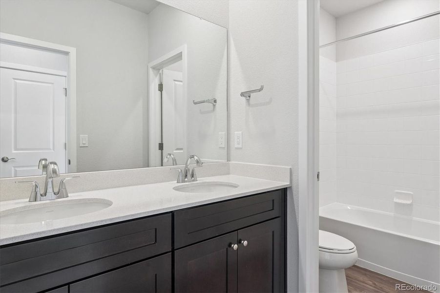 Furnished interior view inside a new home in Floret Collection at Alder Creek, Parker (Image 10).