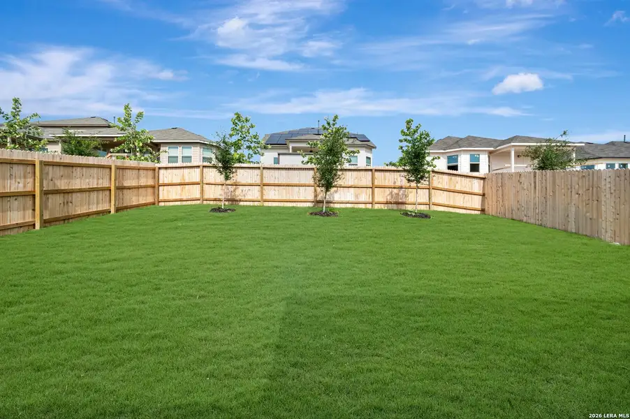 Exterior details and patio area of a home in Mesquite Ridge, San Antonio (Image 3).