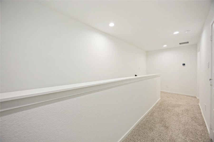 Spacious, unfurnished interior of a new home in Alaia Crossing, Houston (Image 35).