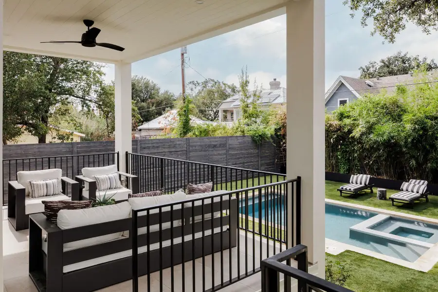 Designed for seamless indoor-outdoor living, the covered terrace offers dining and lounge areas overlooking the pool located off of the main level living area. Designed for seamless indoor-outdoor living, the covered terrace offers dining and lounge areas overlooking the pool located off of the main level living area.